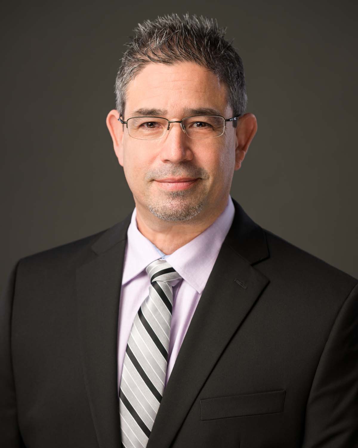 Professional business portrait of a Conroe, Texas Realtor®, taken for marketing and branding purposes. This polished real estate headshot features expert lighting and natural posing, ideal for use on MLS listings, brokerage websites, business cards, social media, and digital marketing materials